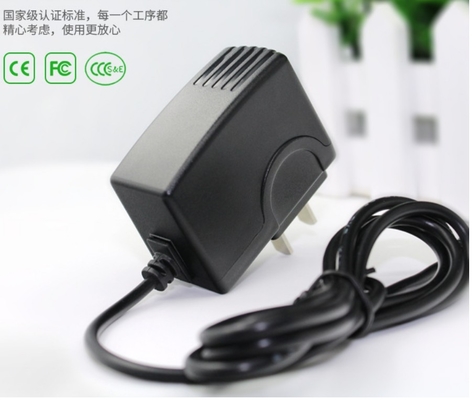Entrée 100-240VAC d'adaptateur de puissance 50/60 hertz -0.3A. Sortie 9VDC 900 mA fournisseur